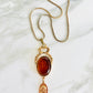Vintage 1970s Unsigned Goldette Carved Venus Cupid Glass Pendant Necklace